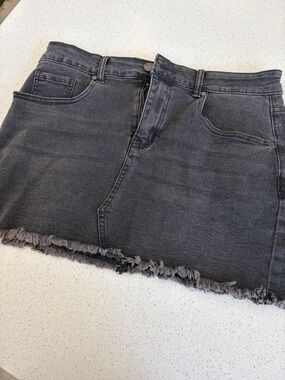 Women’s Washed Black Denim Mini Skirt with Frayed Hem